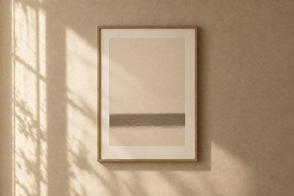 Ballard Framed Print — A soft plaster field interrupted low by one horizon of warm grey